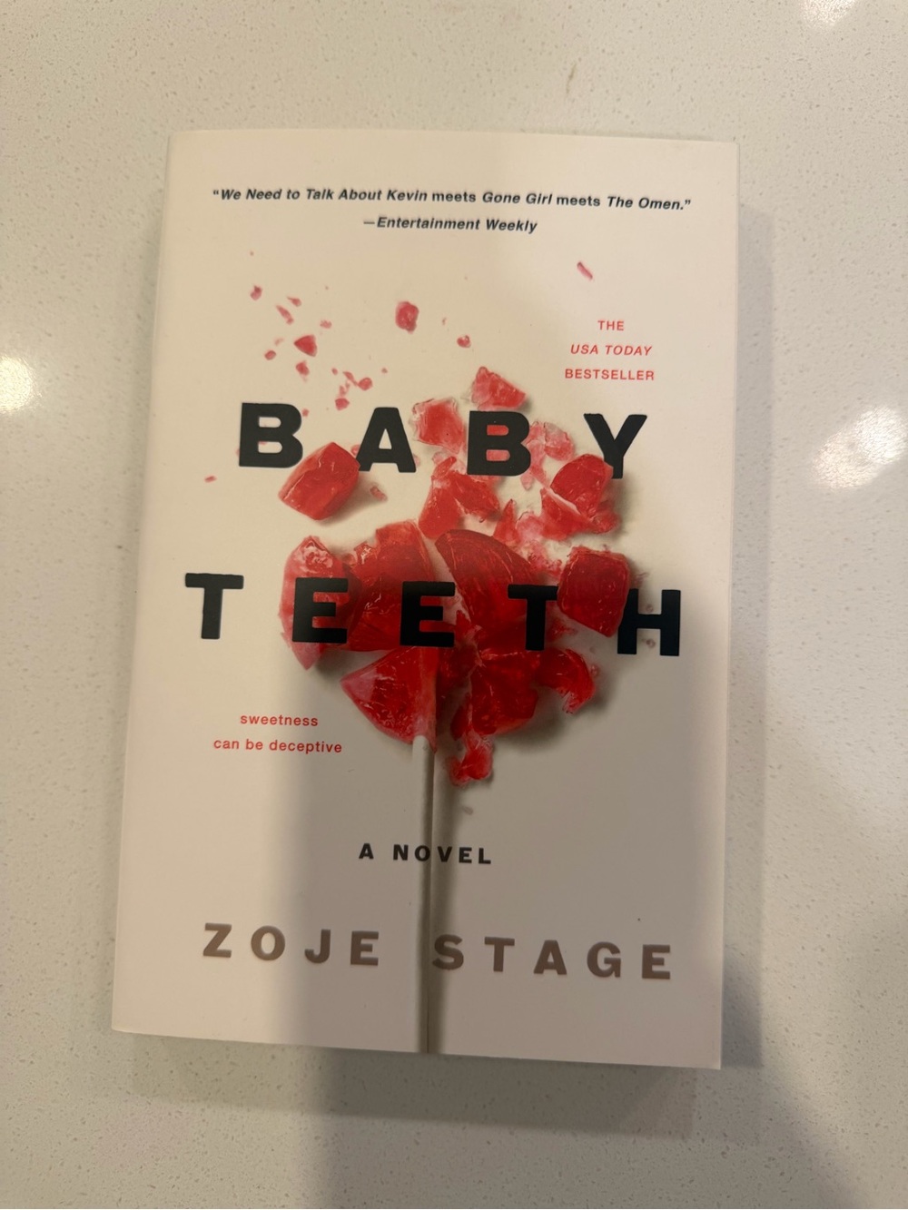 Baby Teeth by Zoje Stage - White & Red Paperback Novel
